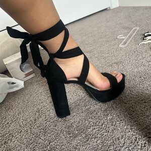 Black platform tie heels